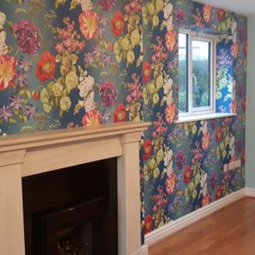 Floral wallpaper hung in livingroom