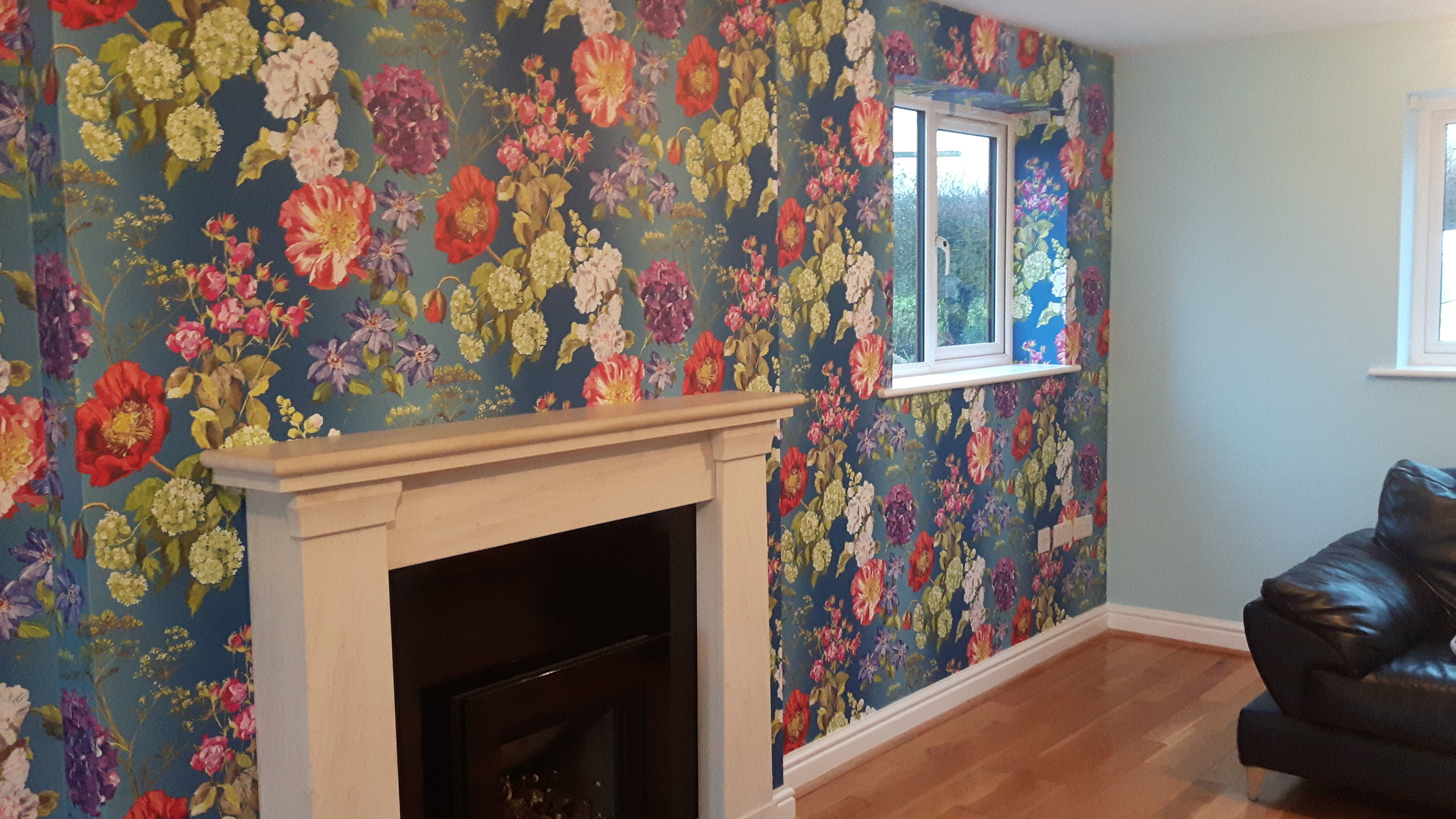 Floral wallpaper hung in livingroom