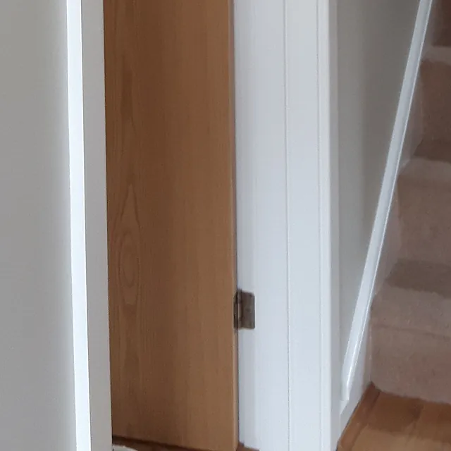 Downstairs hallway painted white