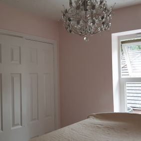 Newly painted bedroom in light pink