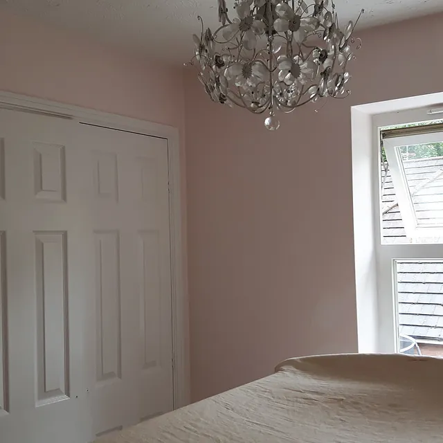 Newly painted bedroom in light pink