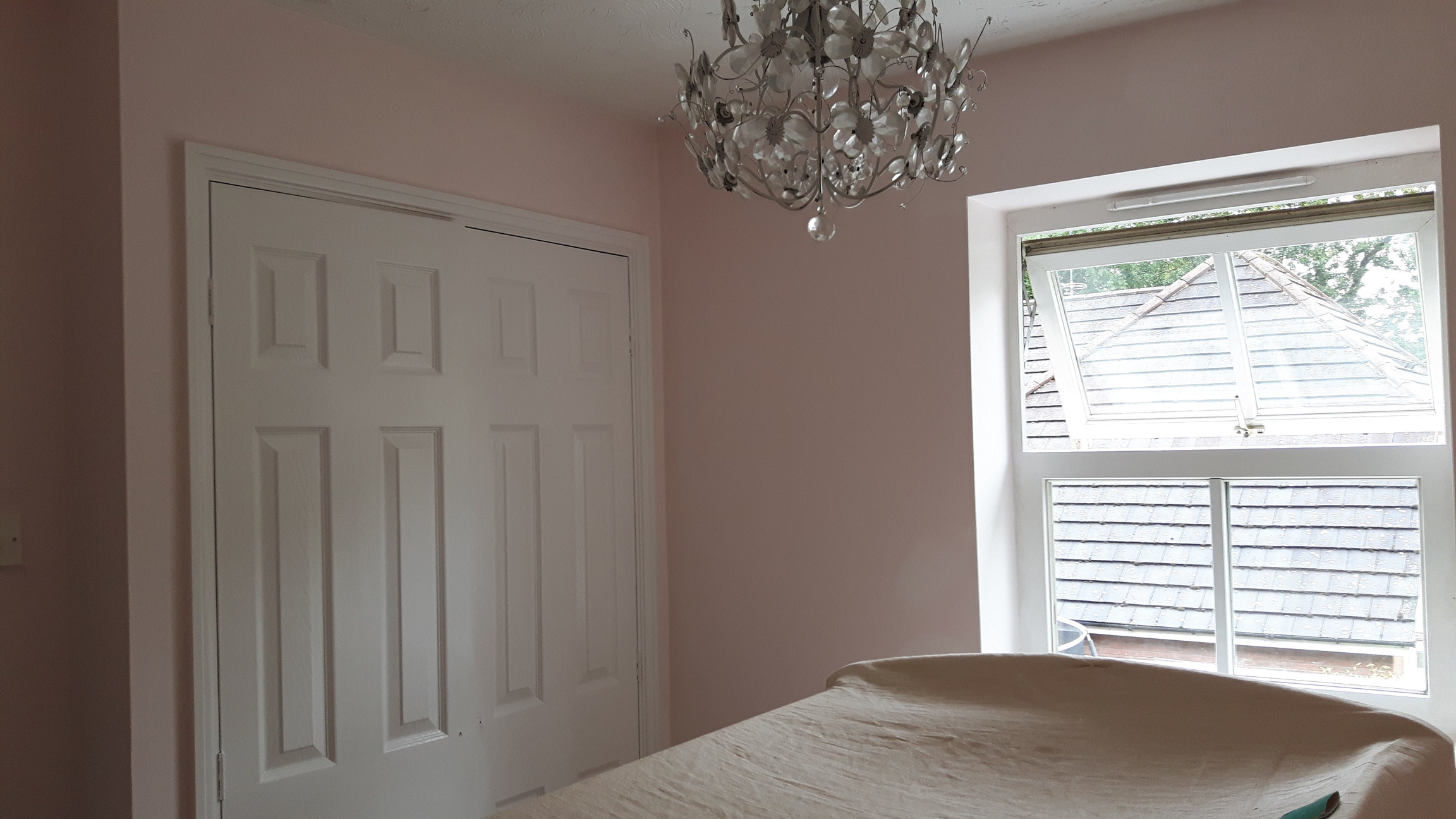 Newly painted bedroom in light pink