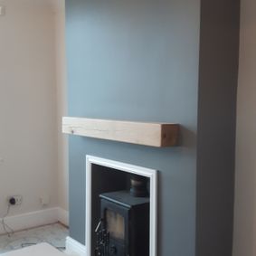 Dark grey paint on fireplace wall 
